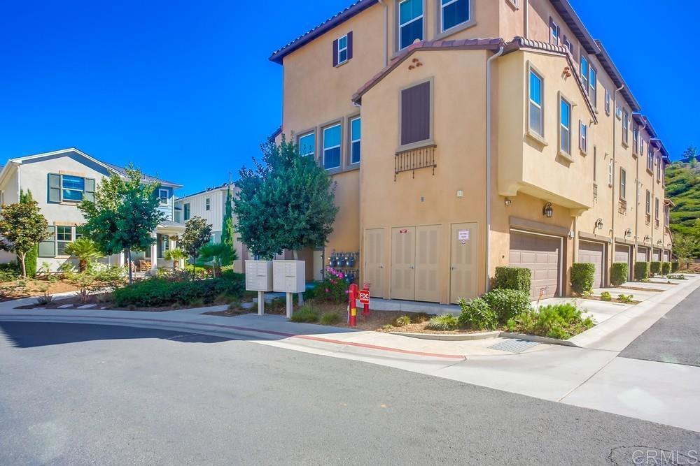 4326 Star Path Way, Unit 1 Oceanside, CA 92056 - Photo 56 of 72 front view of a building with a street