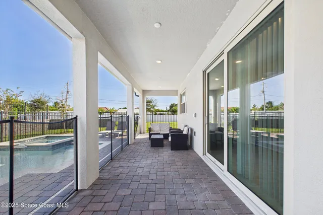 a view of room with stairs and a window