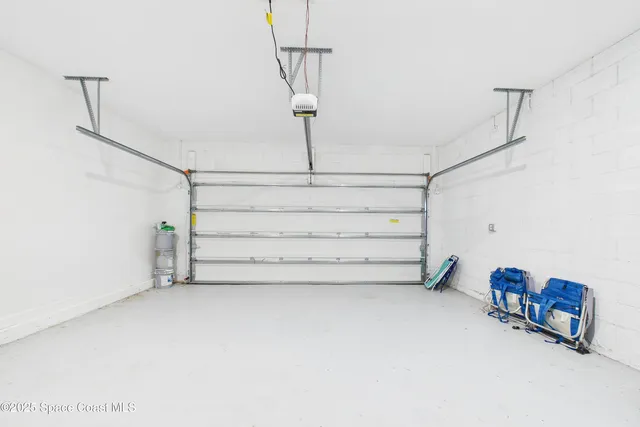 a bathroom with a granite countertop sink toilet and mirror