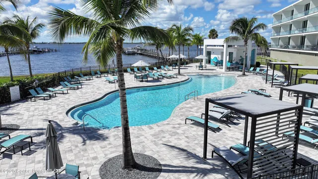 a view of balcony with wooden floor