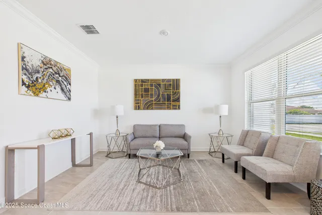 a living room with furniture and a couch