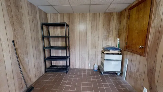 a view of a closet area with furniture