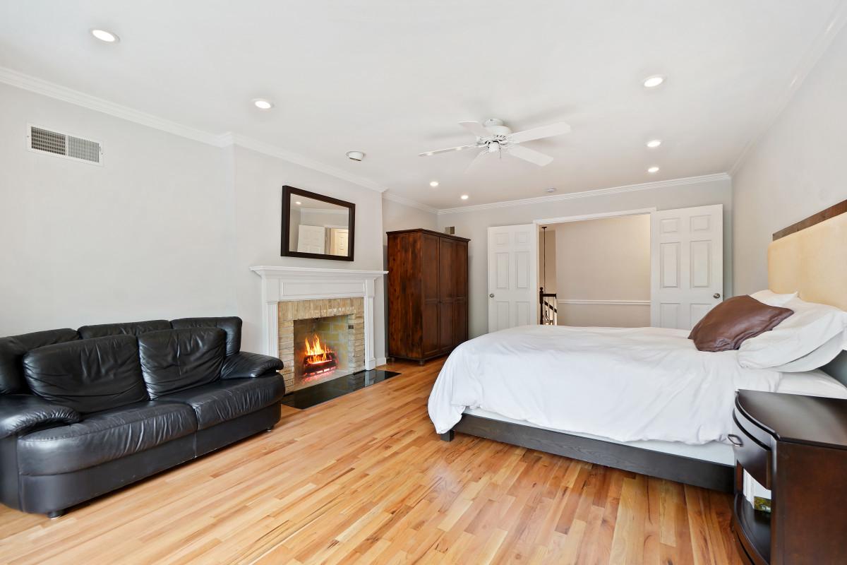 9704 Kendale Road Potomac, MD 20854 - Photo 25 of 70 Primary bedroom with wood burning fireplace
