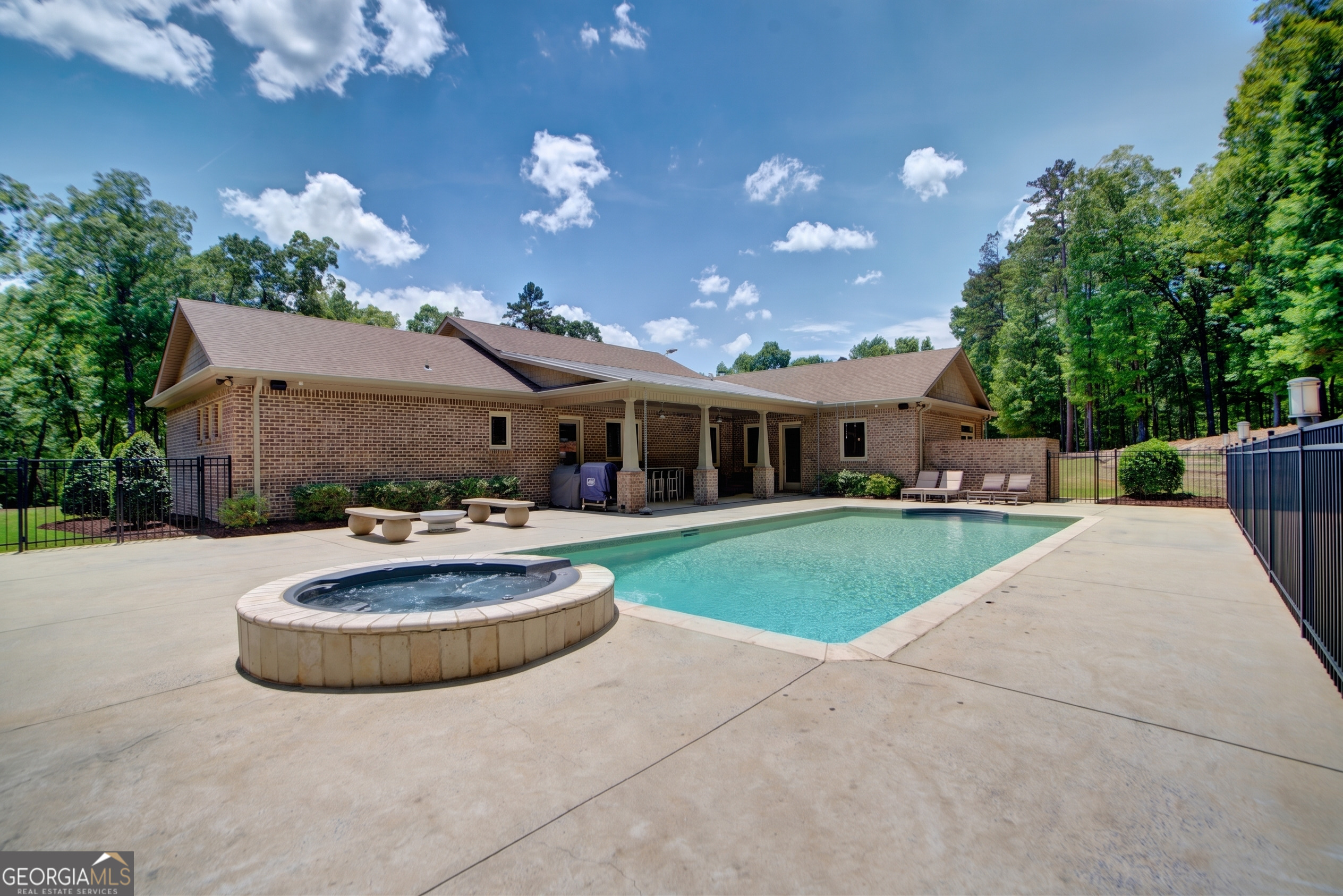 610 Kings Bridge Road Cave Spring, GA 30124 - Photo 59 of 72 a view of a house with swimming pool and a yard