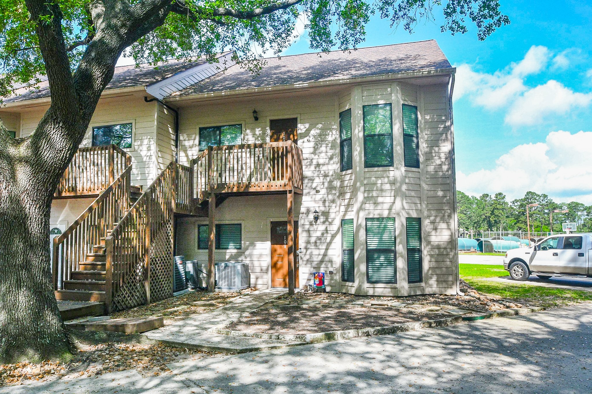 500 River Road, Unit 101 Montgomery, TX 77356 - Photo 2 of 27 1st floor end unit with easy access to all amenities