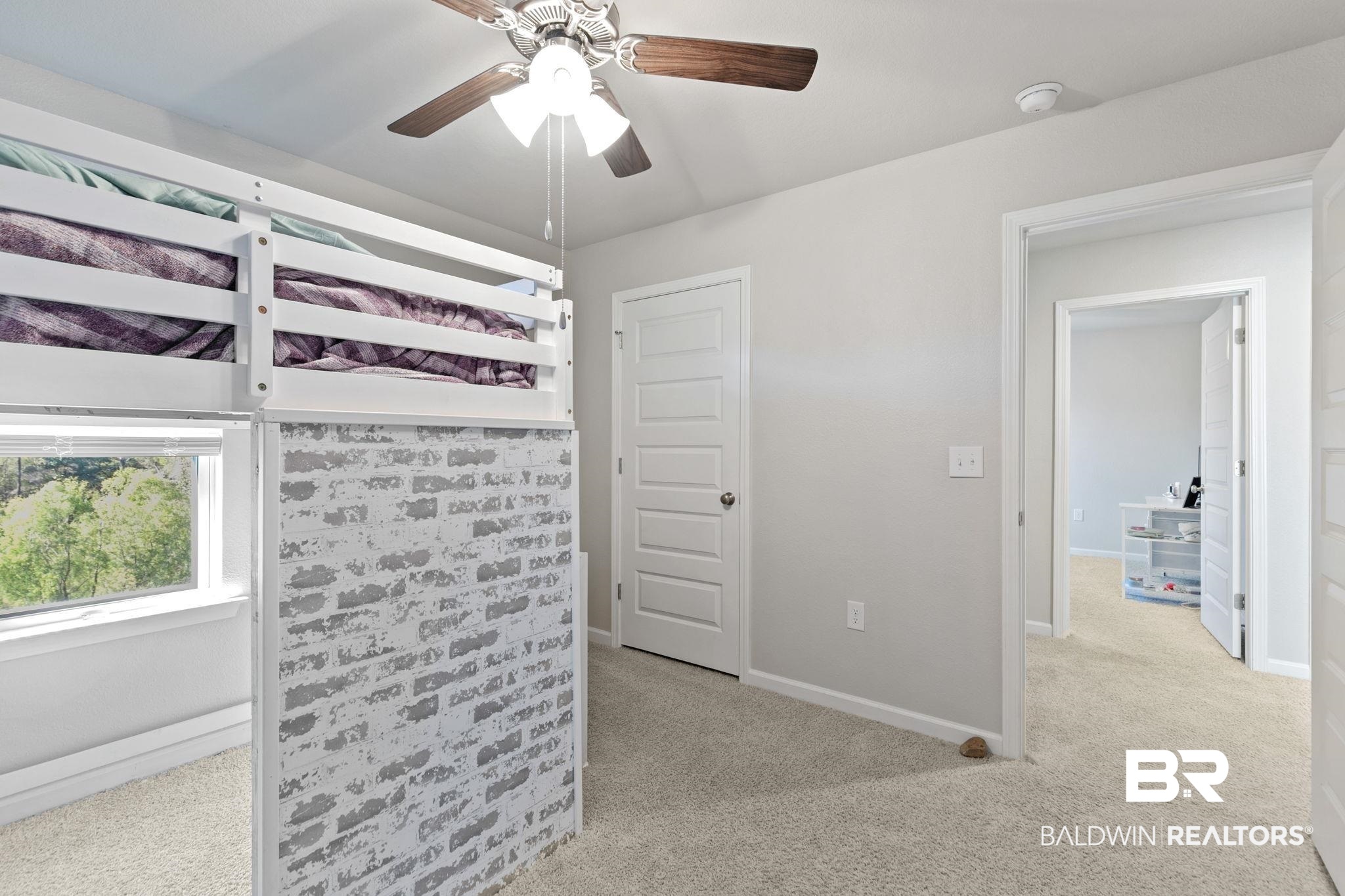 32234 Calder Court Daphne, AL 36527 - Photo 24 of 32 Unfurnished bedroom featuring light colored carpet and a ceiling fan
