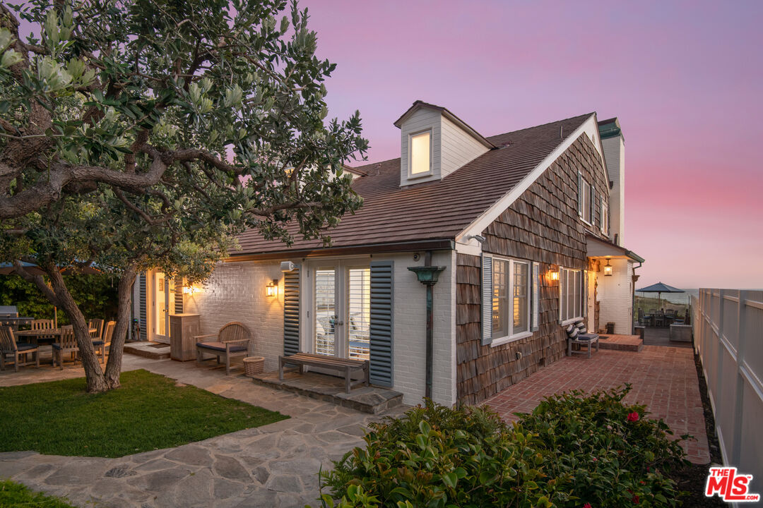 31202 Broad Beach Road Malibu, CA 90265 - Photo 36 of 38 a front view of a house with a yard