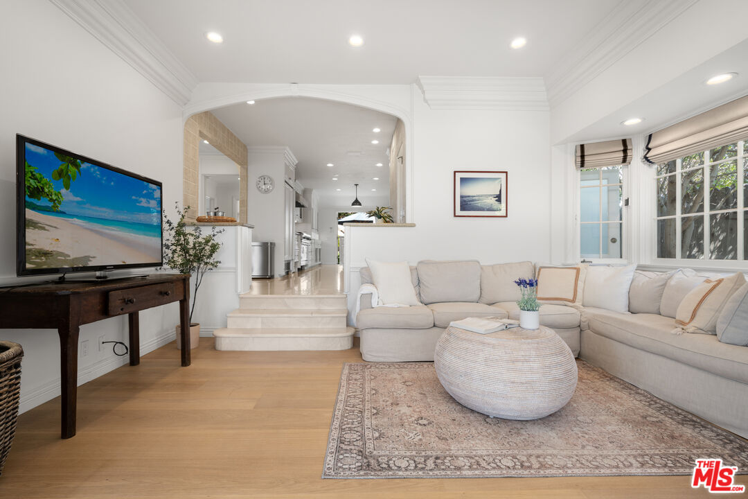31202 Broad Beach Road Malibu, CA 90265 - Photo 10 of 38 a living room with furniture and a flat screen tv