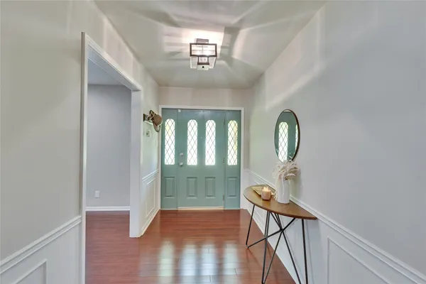 a view of a livingroom with furniture and windows