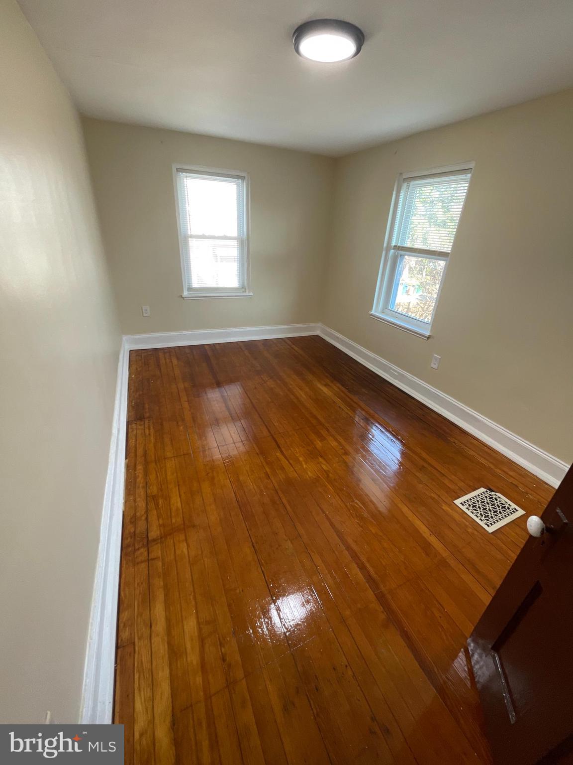 1344 Argus Road Camden, NJ 08104 - Photo 6 of 10 a view of an empty room and window