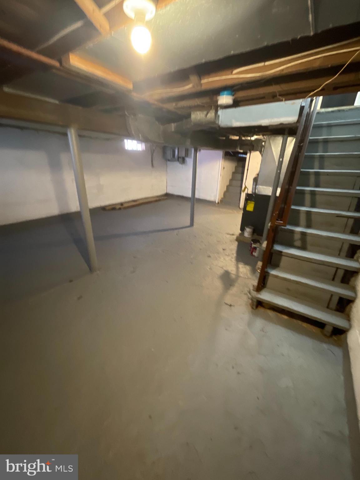 1344 Argus Road Camden, NJ 08104 - Photo 10 of 10 a view of an empty room with stairs