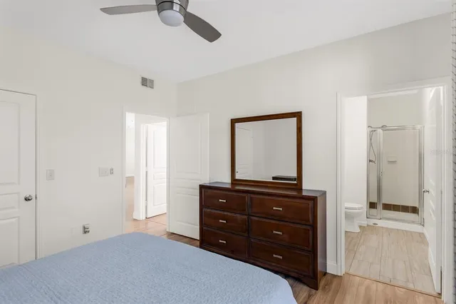 a room with a dresser and a mirror