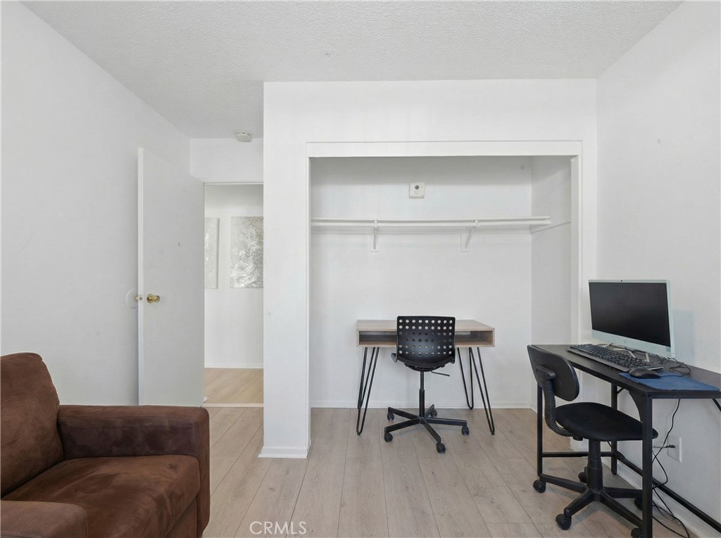 645 West Winchester Drive Rialto, CA 92376 - Photo 16 of 22 a view of a livingroom with furniture and a workspace