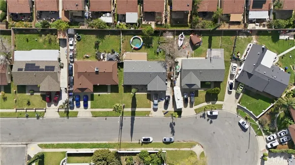 an aerial view of a house with a lake view