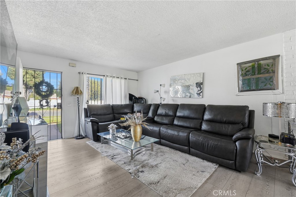 645 West Winchester Drive Rialto, CA 92376 - Photo 5 of 22 a living room with furniture and a flat screen tv