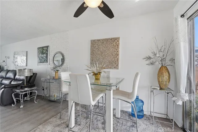 a view of a livingroom with furniture and a chair