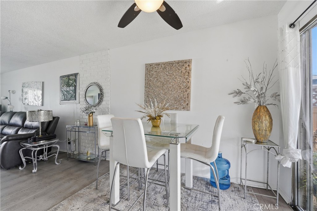 645 West Winchester Drive Rialto, CA 92376 - Photo 10 of 22 a view of a livingroom with furniture and a chair