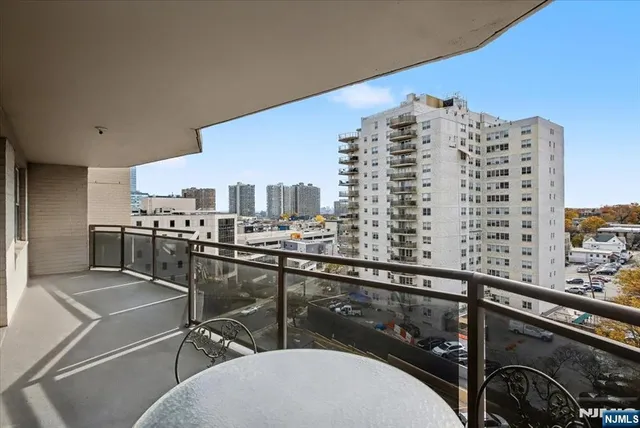 a view of a balcony with city view