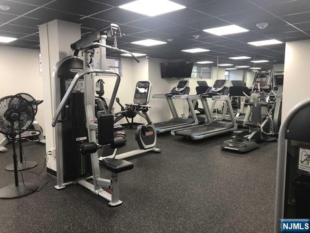 2077 Center Street, Unit 9B Fort Lee, NJ 07024 - Photo 15 of 17 a view of a room with gym equipment