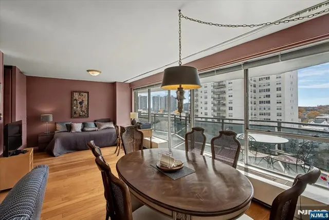 a view of a dining room with furniture window and outside view