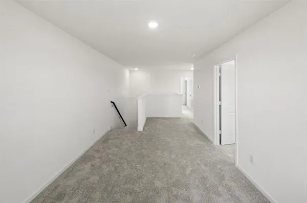 a view of a room with an entryway