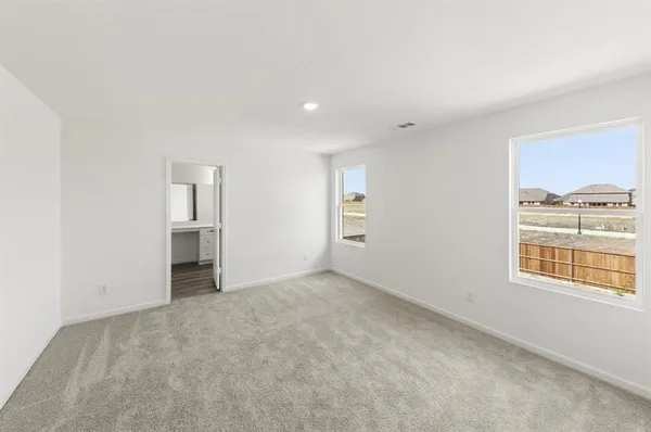 an empty room with windows