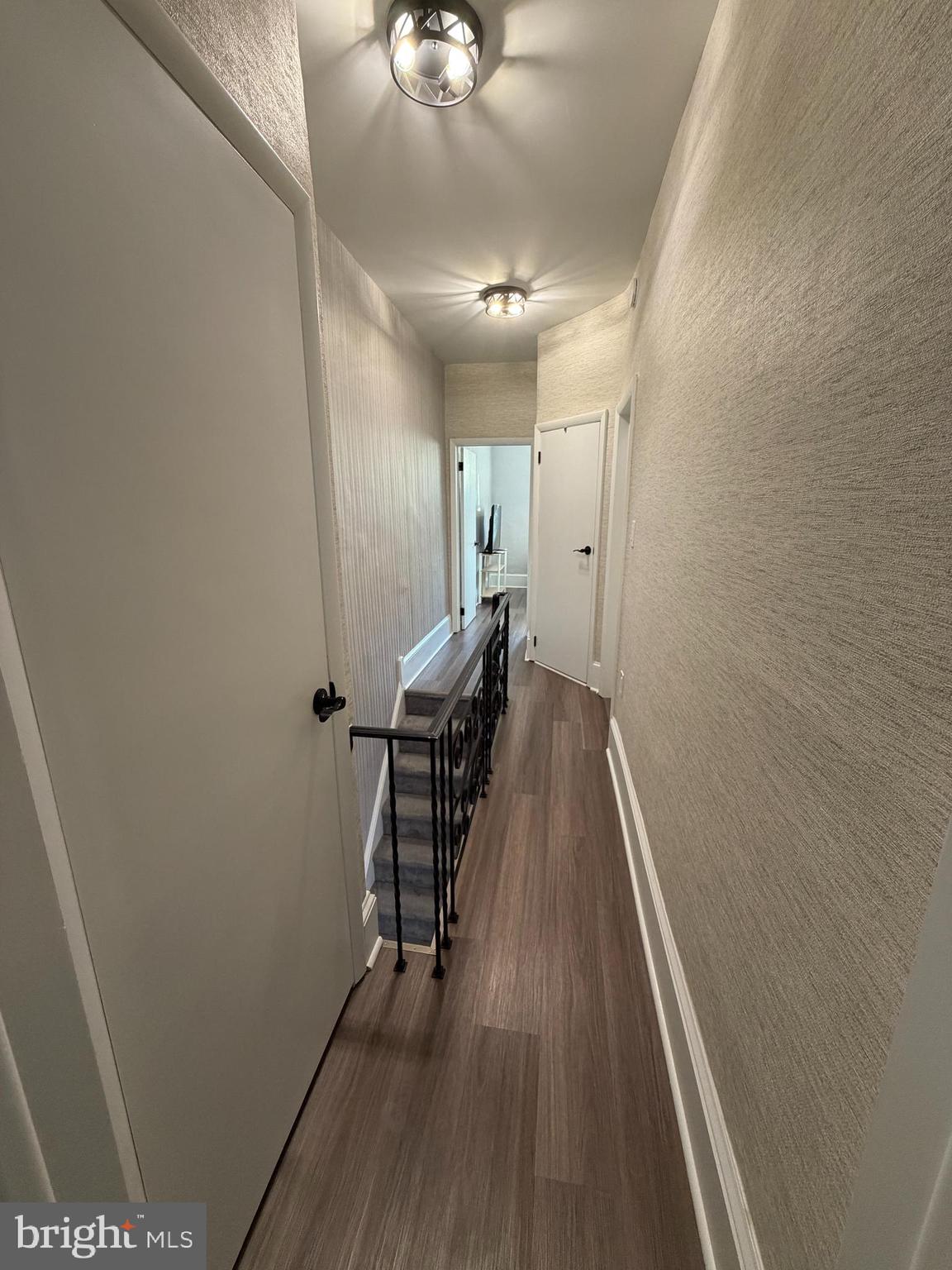 1946 Fitzgerald Street Philadelphia, PA 19145 - Photo 8 of 18 a view of a hallway with wooden floor
