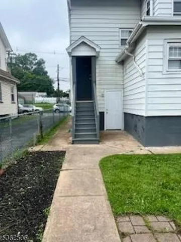 a view of a back yard of the house