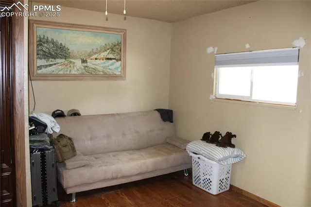a bathroom with a granite countertop shower and a toilet