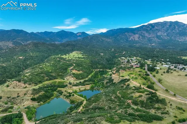 an aerial view of a house with a garden