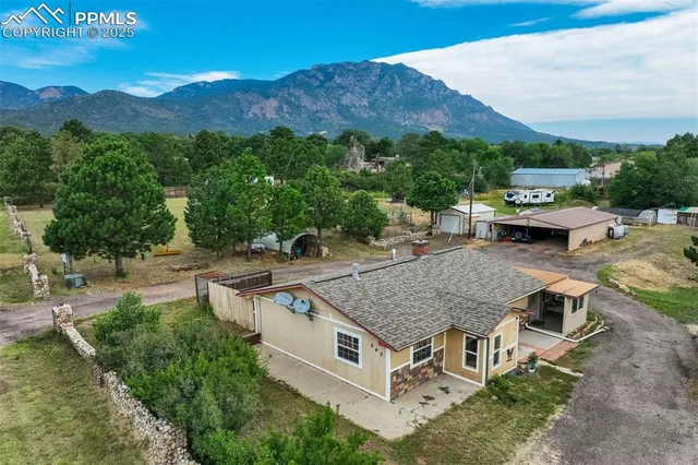 an aerial view of city and lake