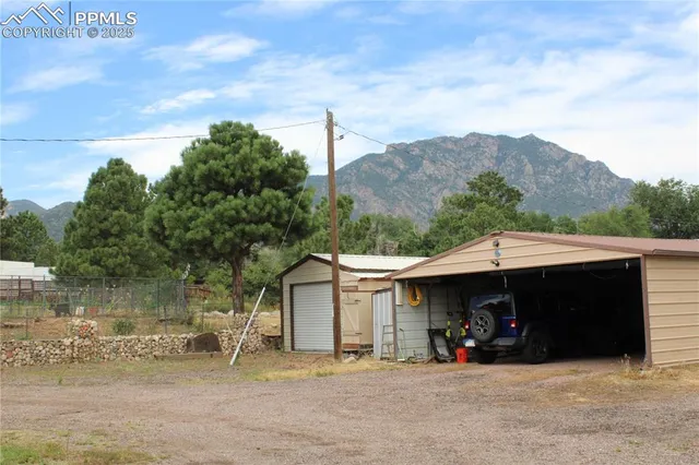 a view of a chairs and table on the terrace