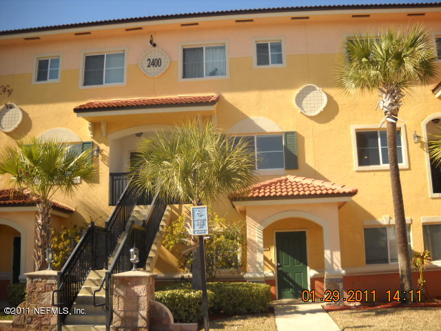 9745 Touchton Road, Unit 2403 Jacksonville, FL 32246 - Photo 1 of 9 a front view of a building