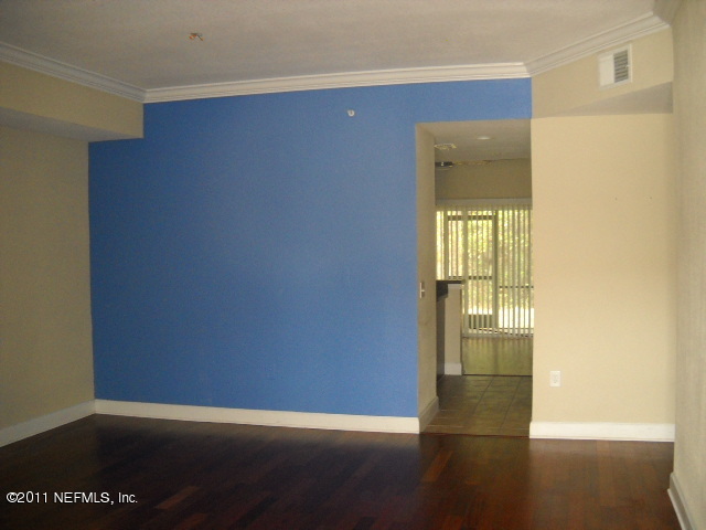 9745 Touchton Road, Unit 2403 Jacksonville, FL 32246 - Photo 2 of 9 a view of an empty room and window