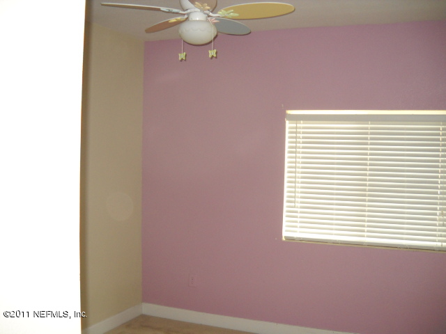 9745 Touchton Road, Unit 2403 Jacksonville, FL 32246 - Photo 4 of 9 a view of a window in a room