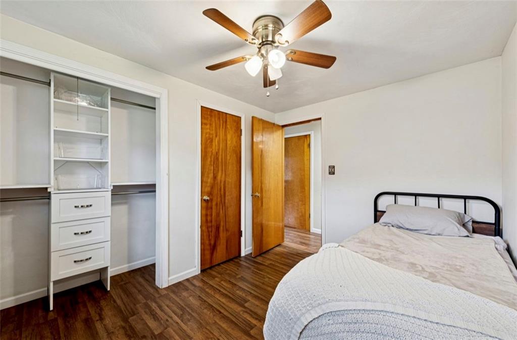 501 Highway 356 Apollo, PA 15613 - Photo 17 of 35 a bedroom with a bed and a chandelier