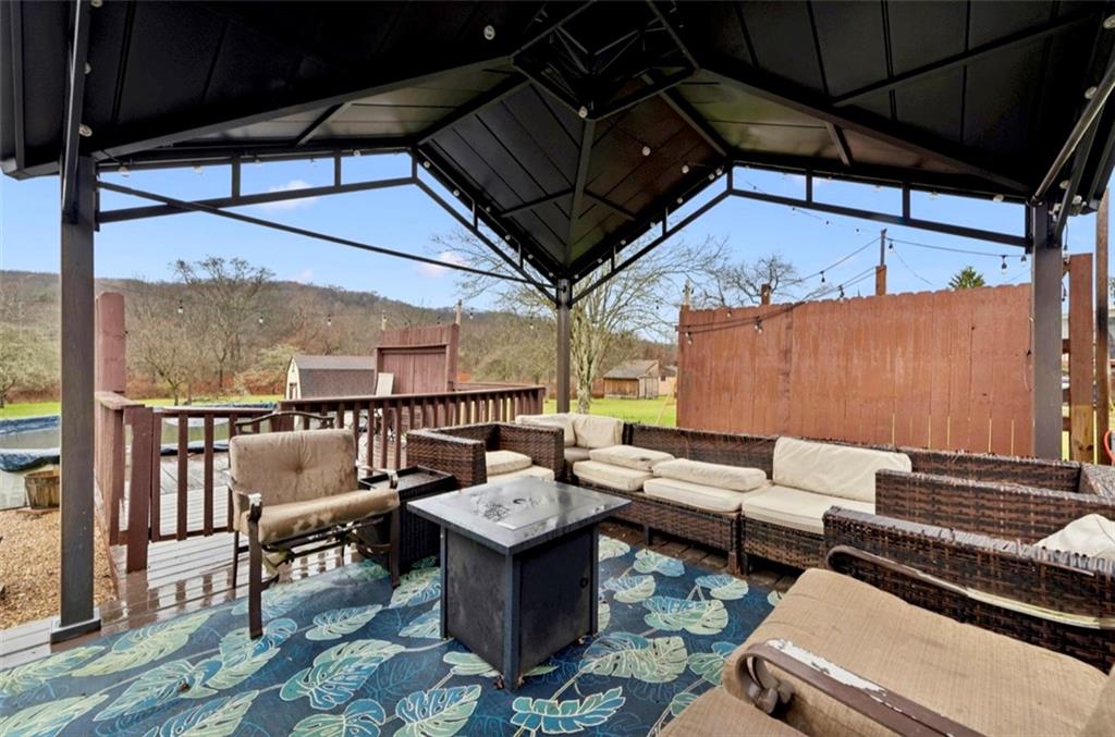 501 Highway 356 Apollo, PA 15613 - Photo 29 of 35 a roof deck with table and chairs