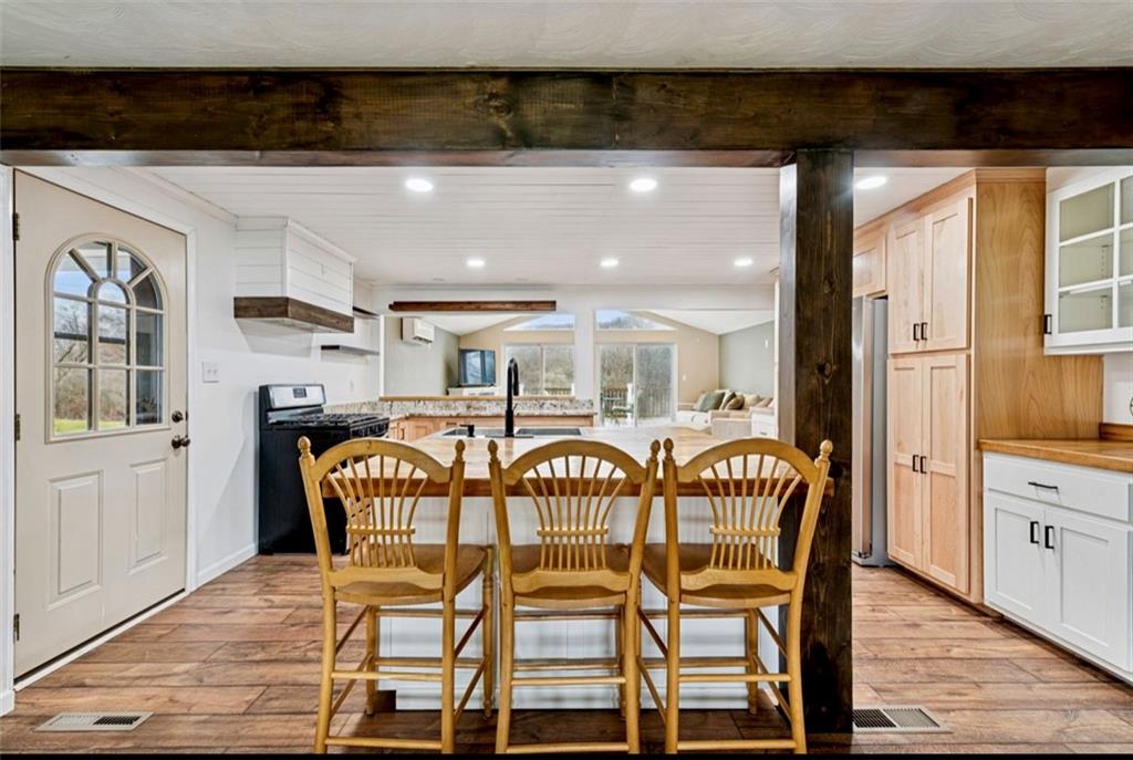 501 Highway 356 Apollo, PA 15613 - Photo 7 of 35 a view of a dining room with furniture and a chandelier
