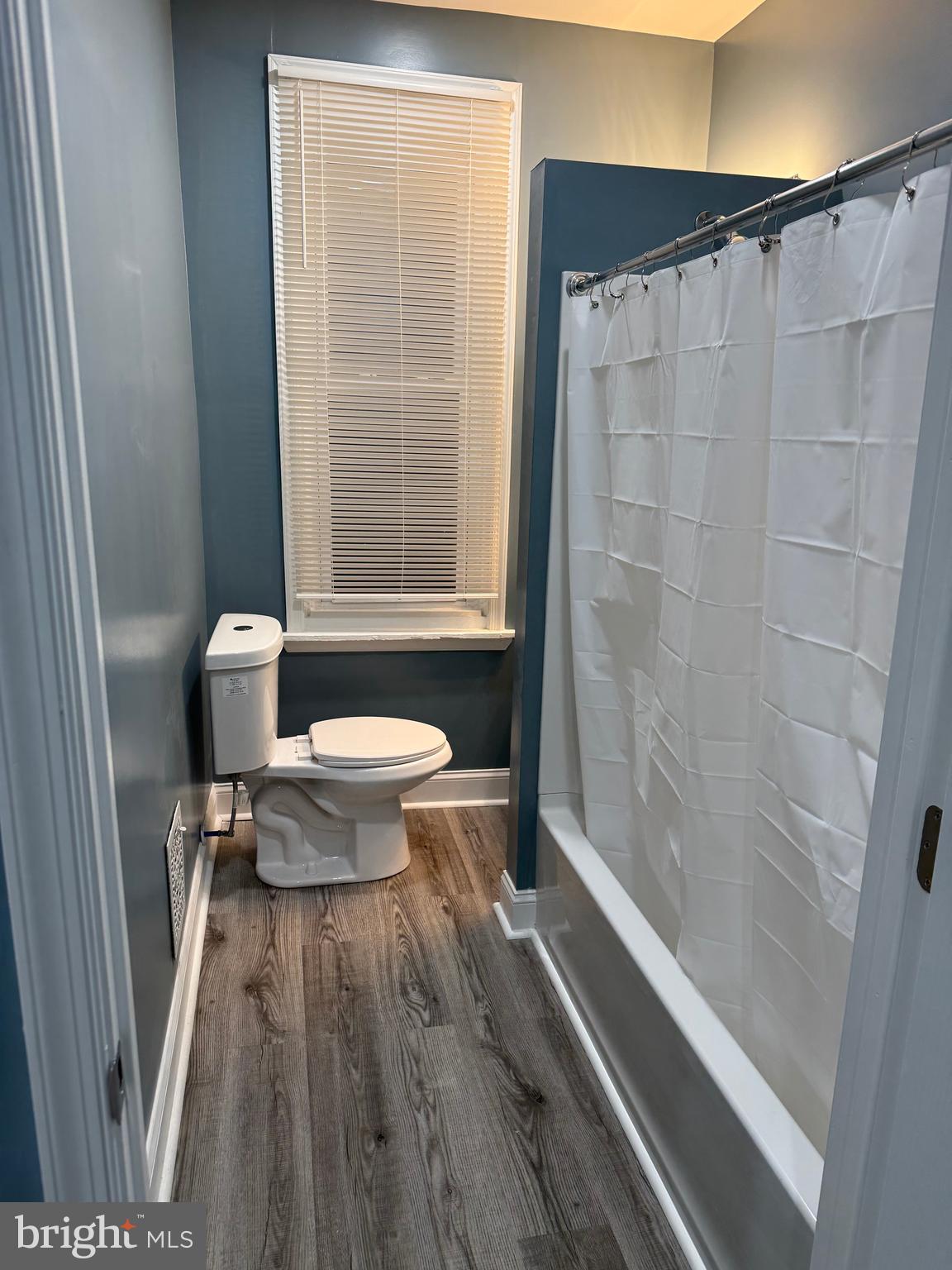 5332 Pine Street, Unit 2 Philadelphia, PA 19143 - Photo 15 of 21 a bathroom with a toilet and a shower