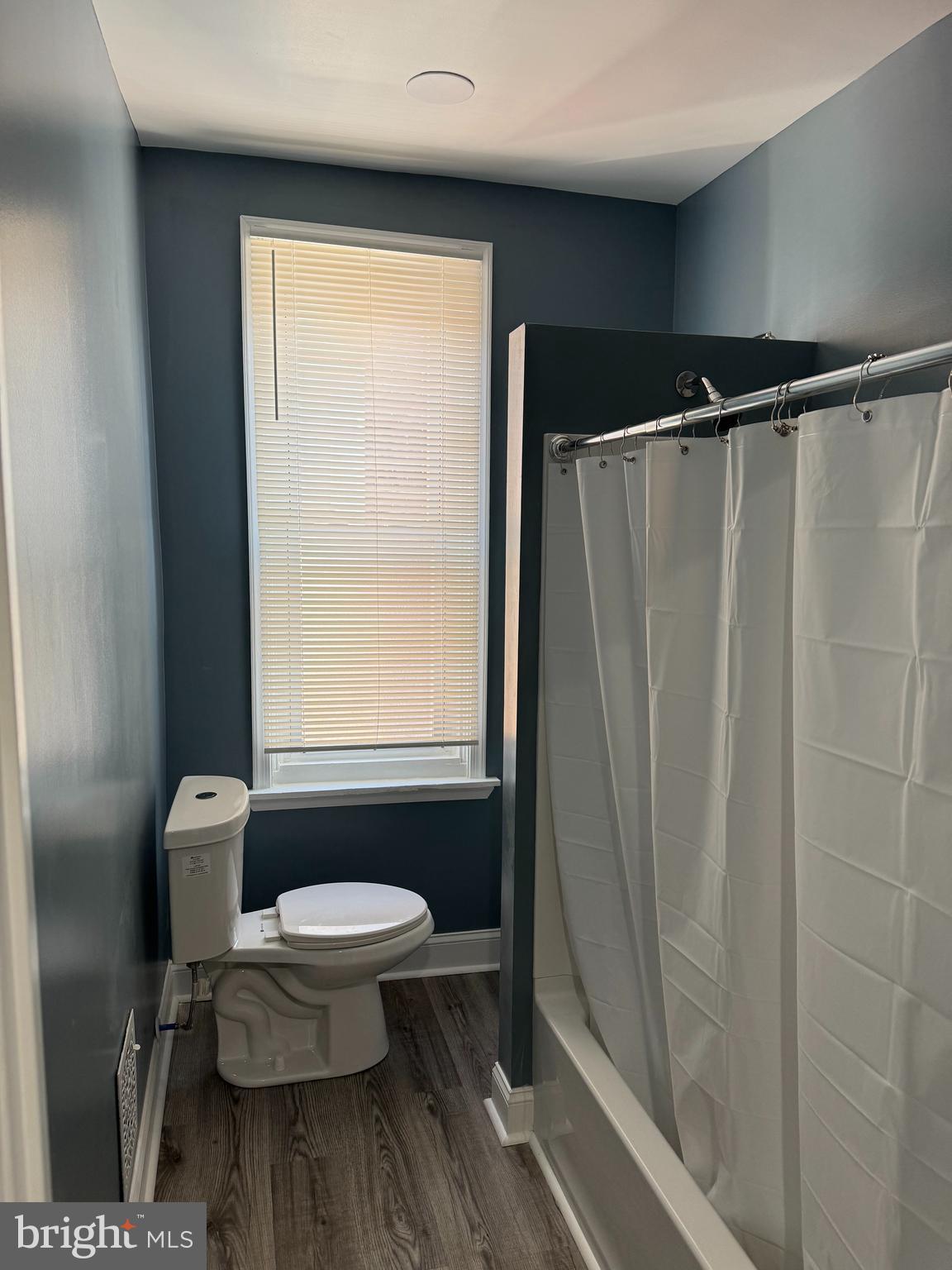5332 Pine Street, Unit 2 Philadelphia, PA 19143 - Photo 10 of 21 a bathroom with a toilet and a shower