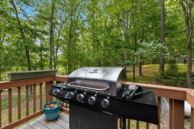 a bedroom with a bed and a fireplace