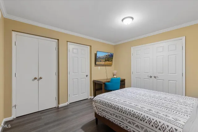 a view of a patio with table and chairs and potted plants