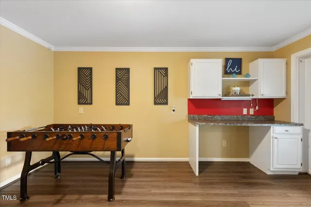 a view of a chairs and table in the patio