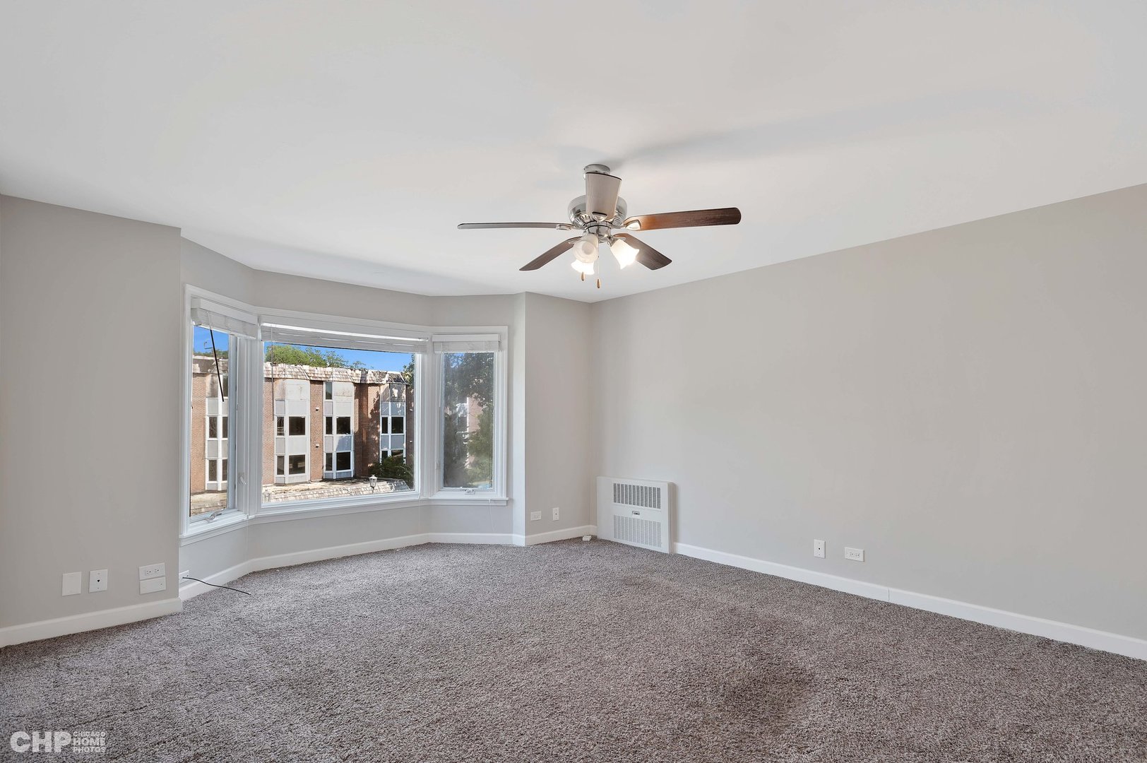 201 Thames Parkway, Unit 2F Park Ridge, IL 60068 - Photo 11 of 19 a view of an empty room with a window