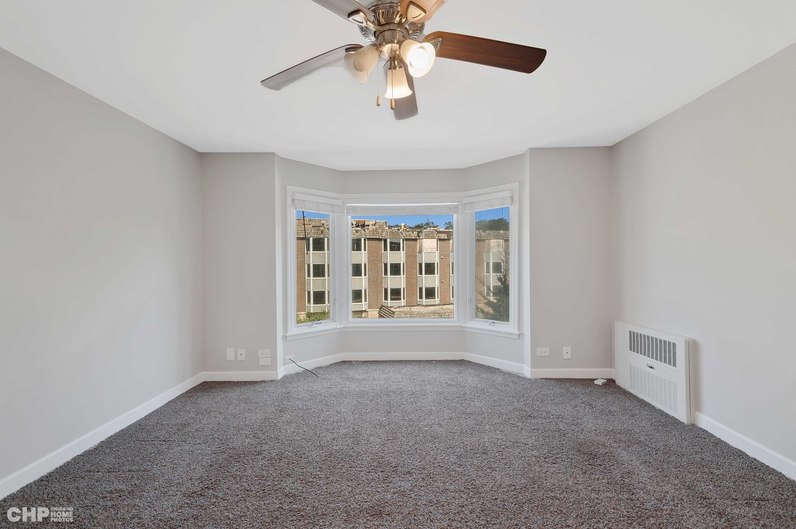 201 Thames Parkway, Unit 2F Park Ridge, IL 60068 - Photo 12 of 19 a view of an empty room with a window