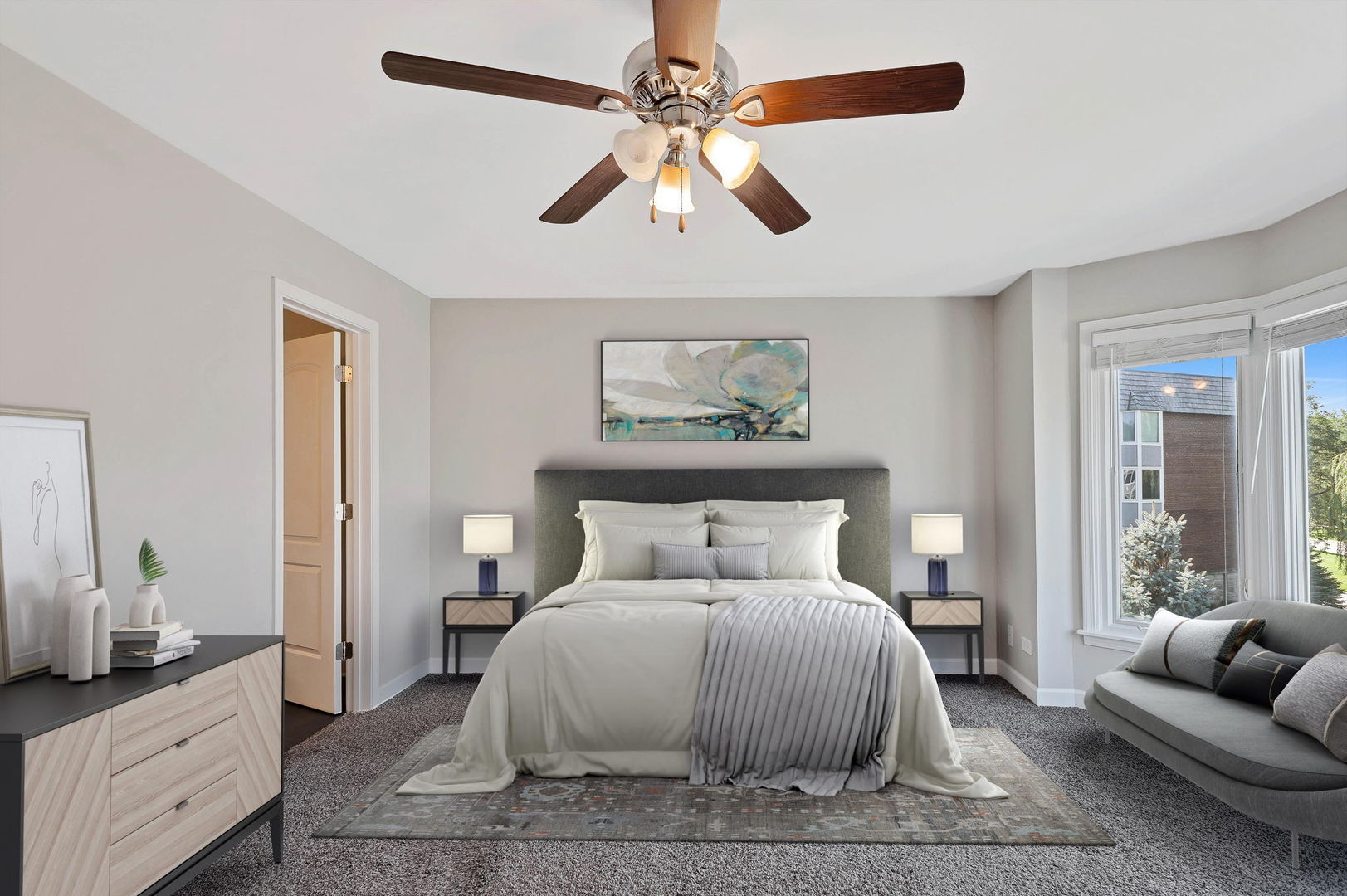 201 Thames Parkway, Unit 2F Park Ridge, IL 60068 - Photo 14 of 19 a bedroom with a large bed and a chandelier