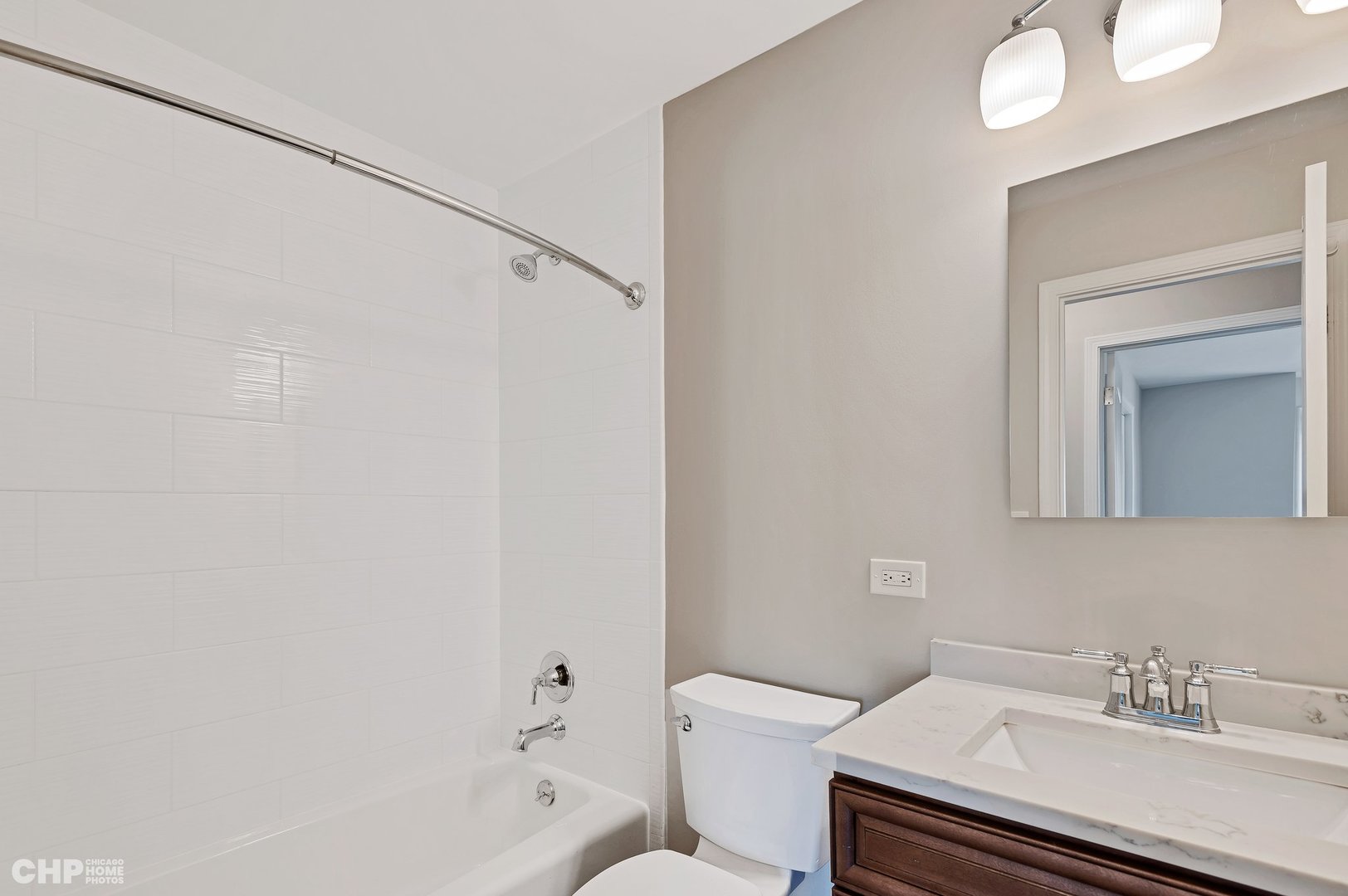 201 Thames Parkway, Unit 2F Park Ridge, IL 60068 - Photo 18 of 19 a bathroom with a sink toilet and shower