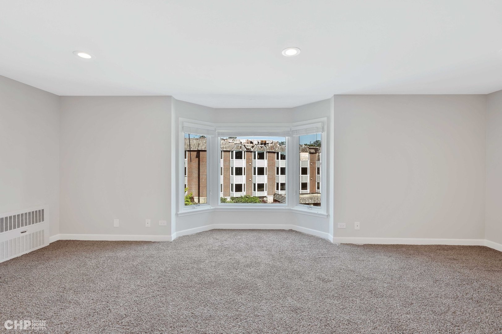 201 Thames Parkway, Unit 2F Park Ridge, IL 60068 - Photo 9 of 19 a view of an empty room with a window
