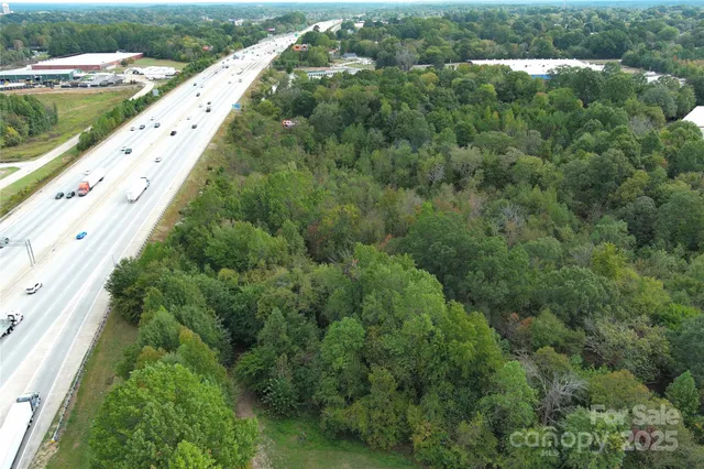 a view of a garden with a building