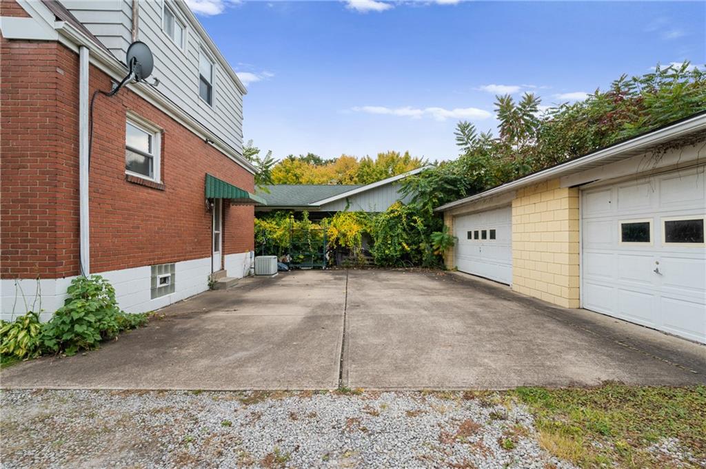 105 Delafield Road Pittsburgh, PA 15215 - Photo 3 of 18 a view of a house with a yard